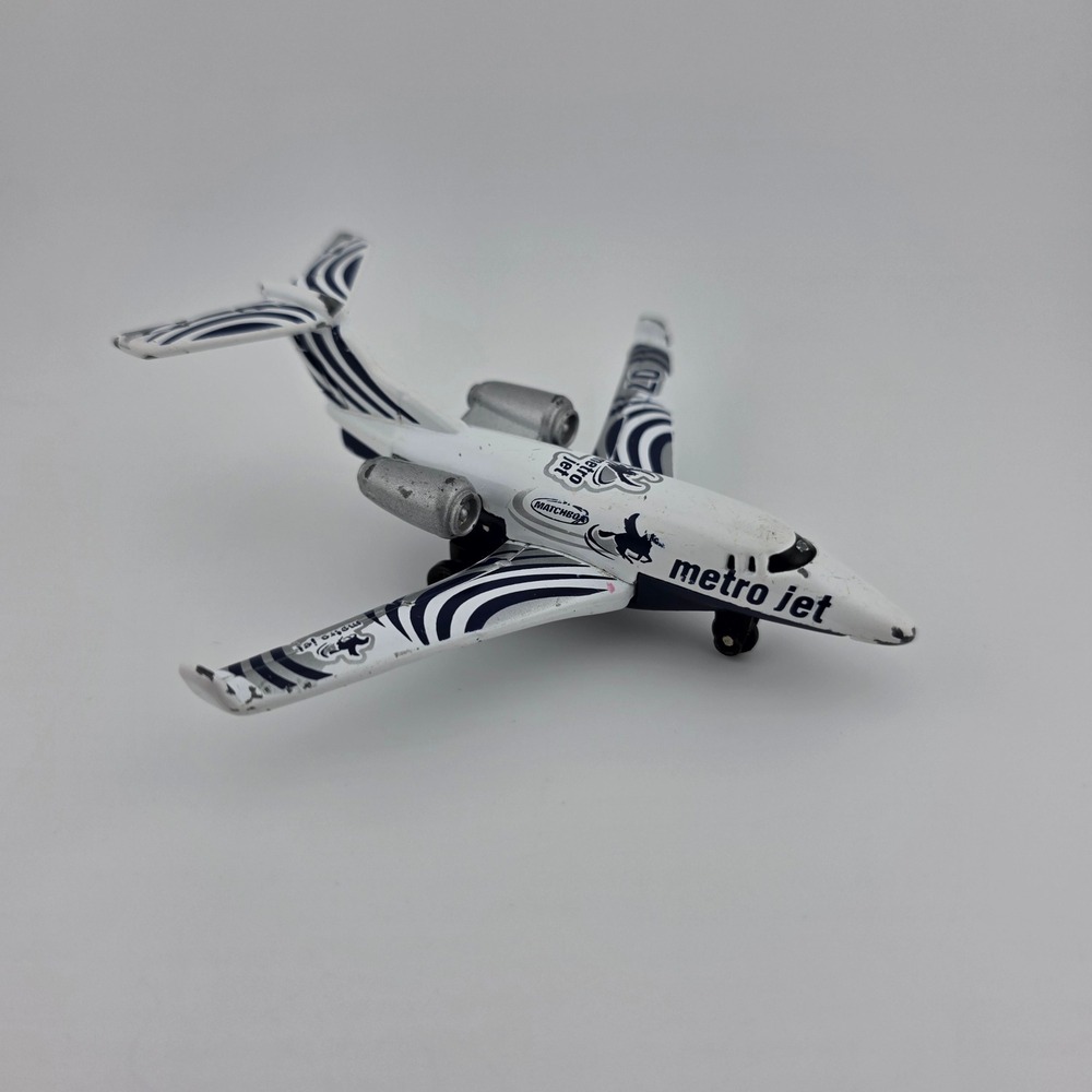 Matchbox Metro Jet Airplane Diecast Toy White Blue Stripes 2002‎ Mattel